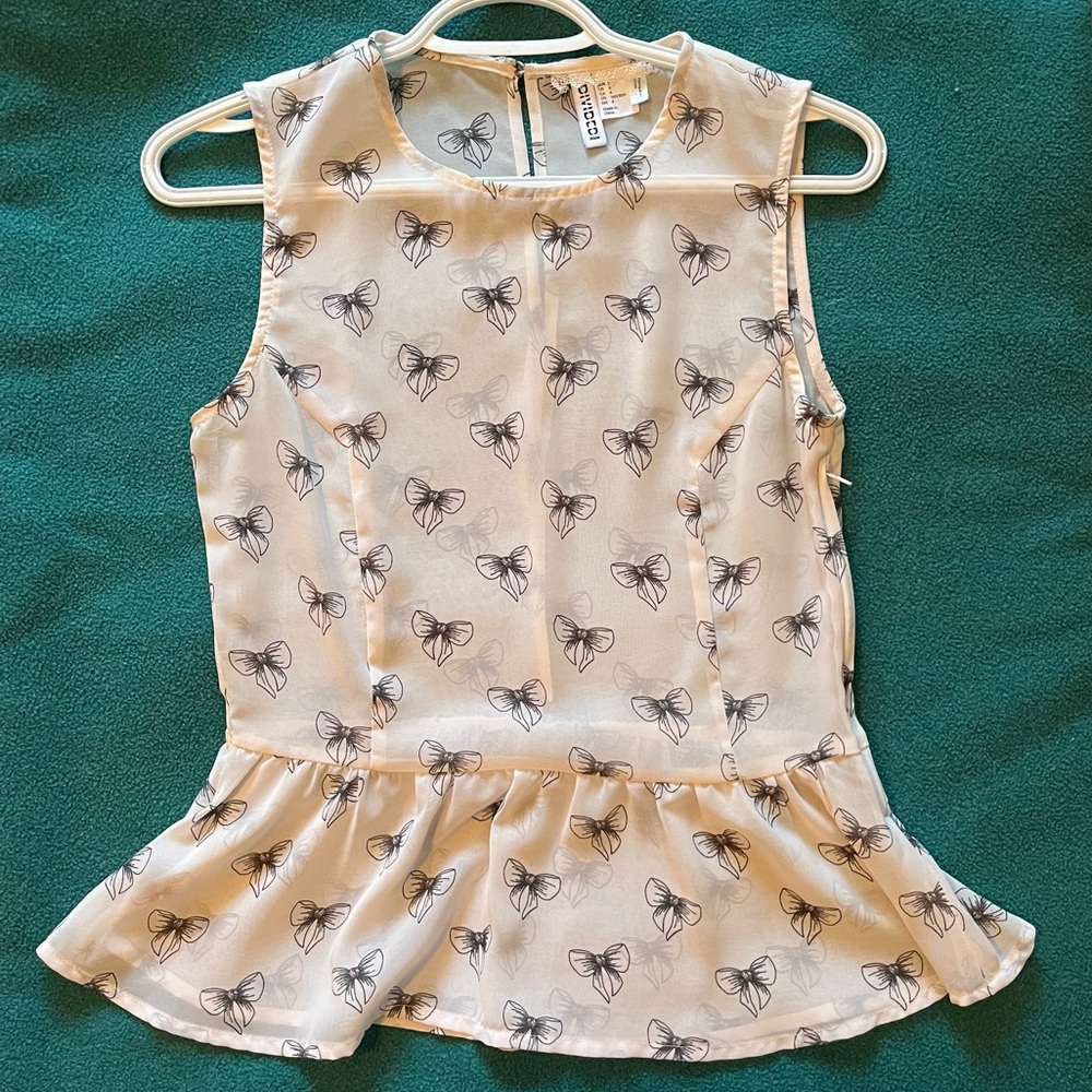 Peplum Sleeveless Blouse